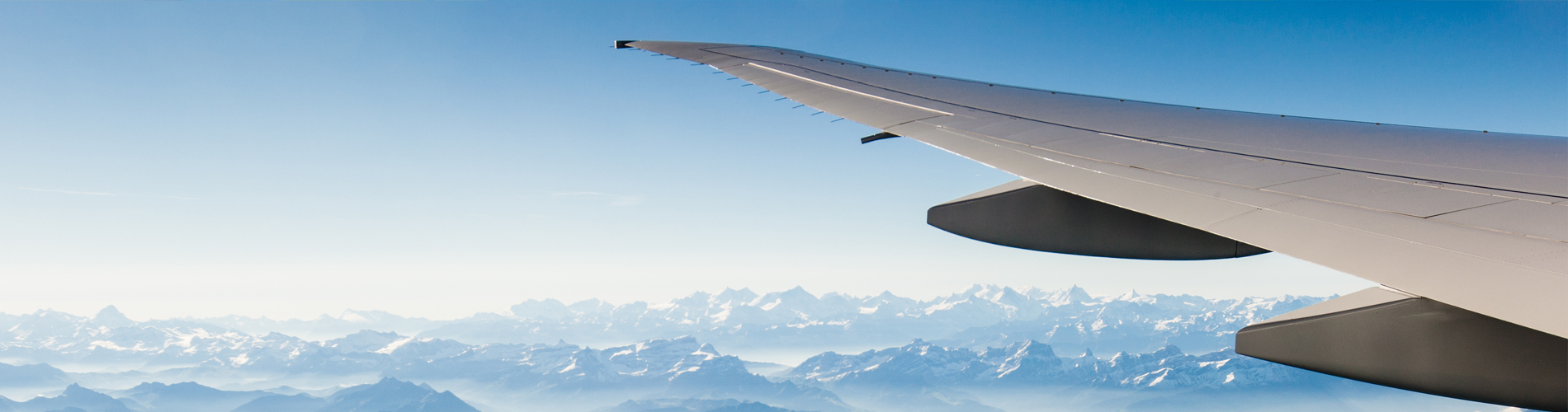 Travel Plane background mountains 1900x500