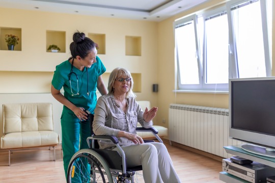 an-older-disabled-woman-is-receiving-a-positive-advice-from-a-young-female-doctor-at-home.jpg-540x360
