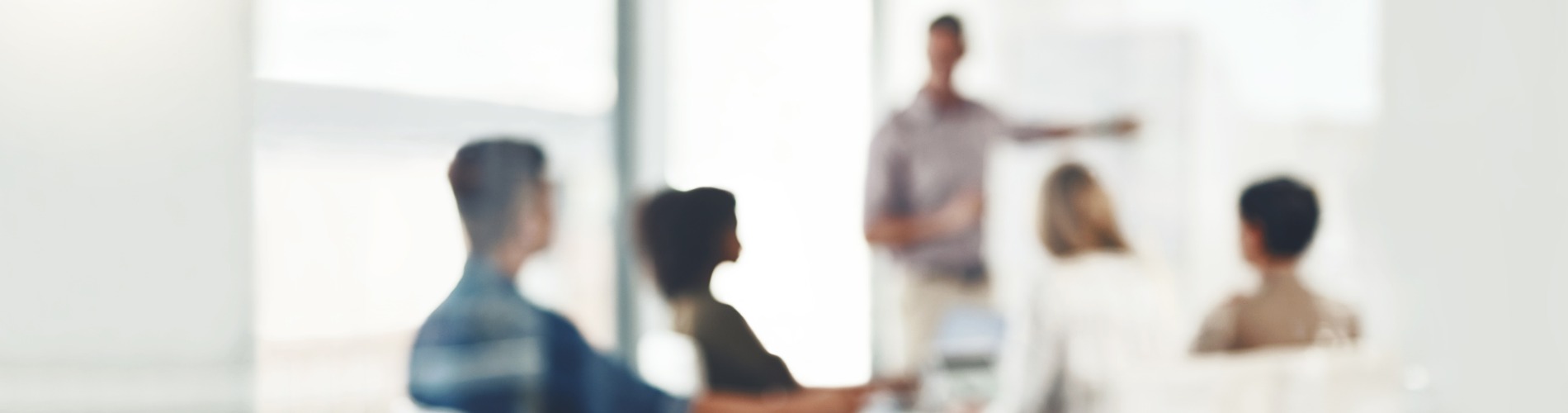 Business colleagues meeting together in room stock photo 1900 x 500