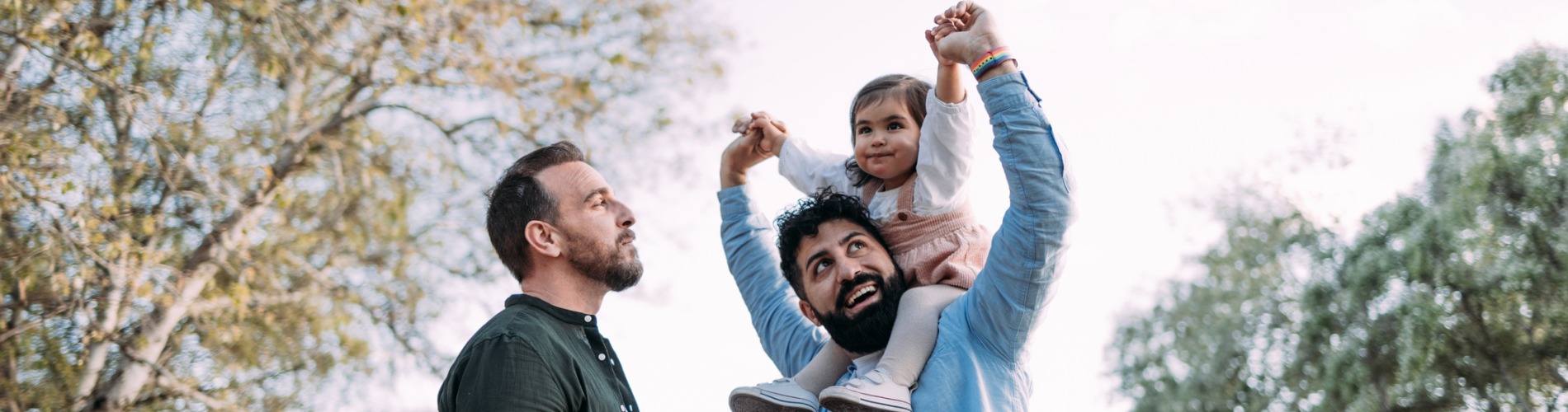 gay-couple-with-their-young-daughter-1900x500