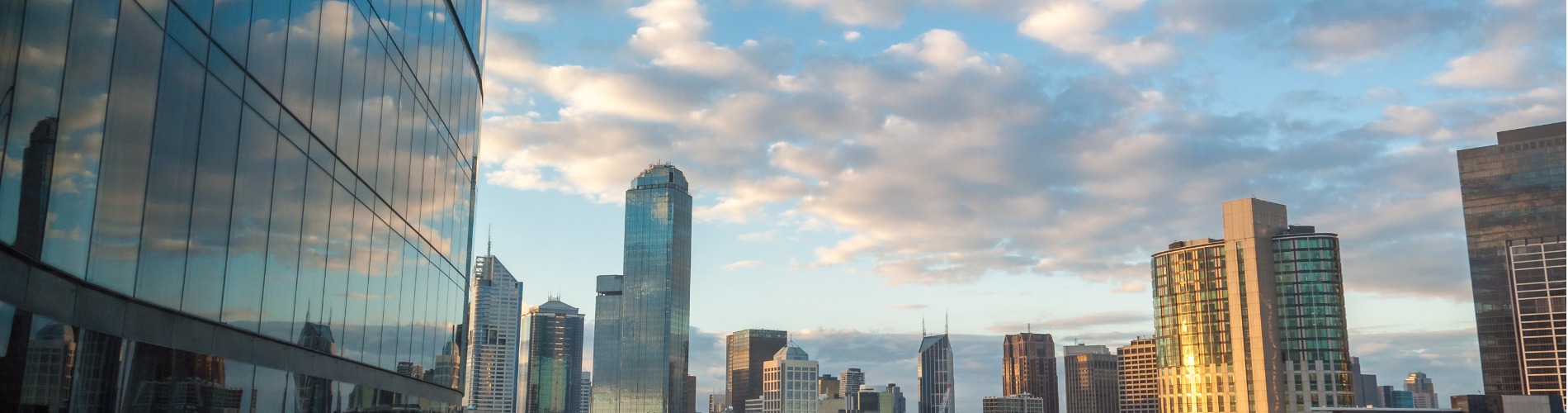 modern-cityscape-with-office-buildings-and-skyscrapers 1900x500