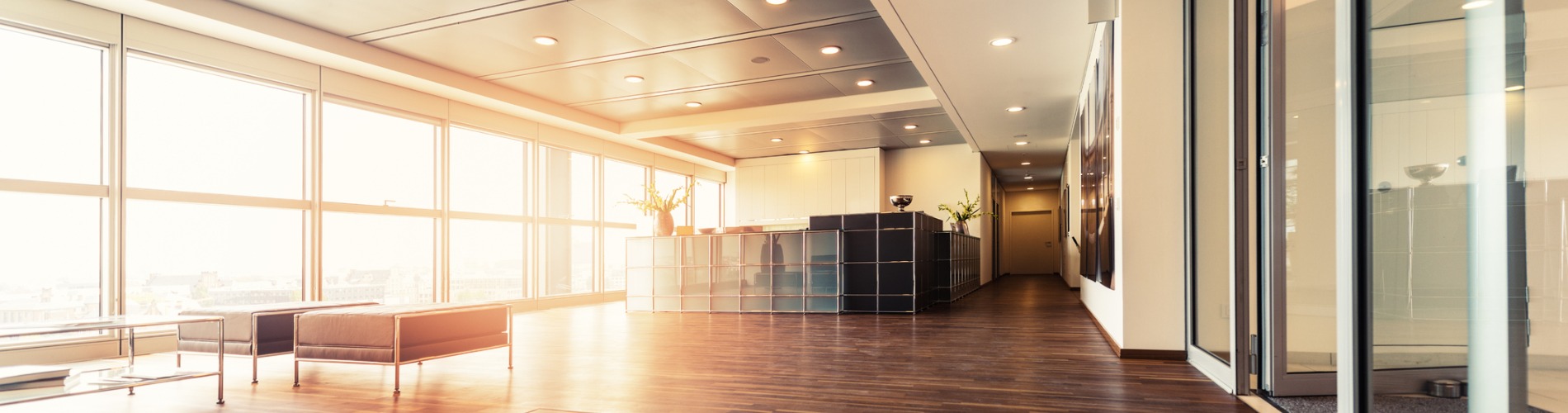 office-reception-with-wood-floors-and-window-wall- 1900 x 500